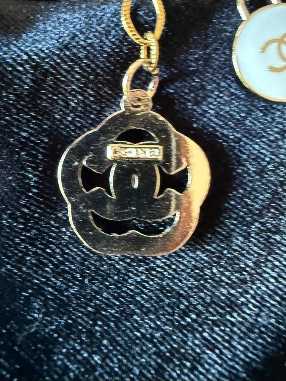 ChaneI Gold-Tone Keyring with White Ribbon and Black Logo and Gold Charms - Picture 7 of 10